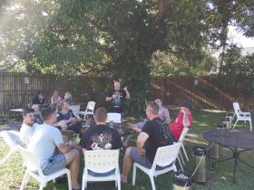 WO1 Dean Goninan ASM 3 Bde holds office with NQ OJT contingent