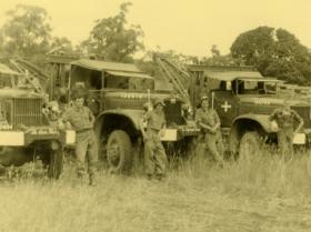 Rex Devlin, next guy unknown, third is Bernie Riding.  Number 4 and 5 is me and Bugsy Burrows.  Photo taken at Glen Geddes Siding.  We had just backloaded some vehicles to the rail head