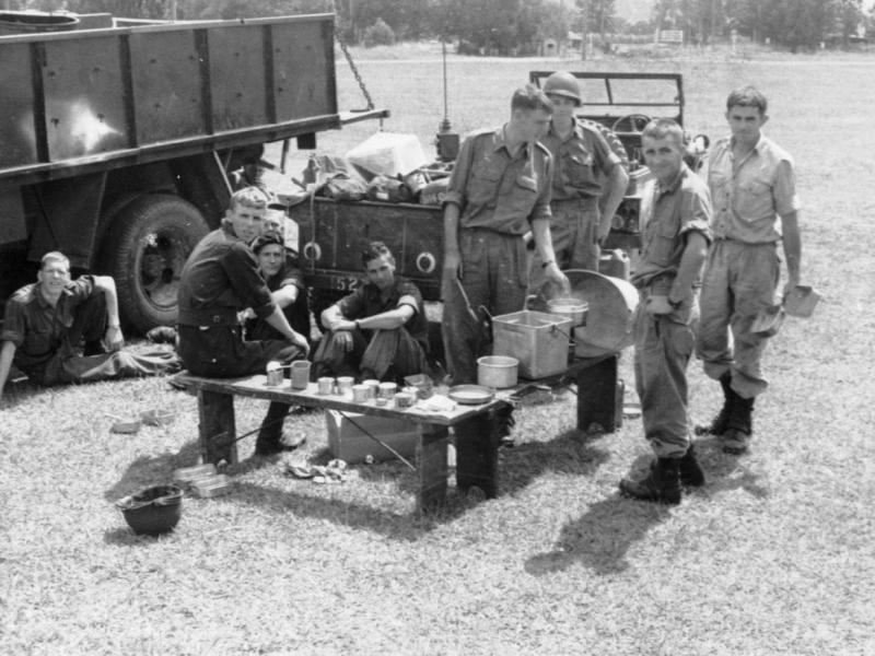 Breakfast 1966 - This was taken on exercise in the Northern Rivers. I can't recognise all these blokes, I'm sitting next to the CL truck, Sgt Ben Wiggan and Sgt Burroughs at the rear of the trailer. Rex Devlin is far right with the dixies. I can't plac Breakfast 1966 - This was taken on exercise in the Northern Rivers. I can't recognise all these blokes, I'm sitting next to the CL truck, Sgt Ben Wiggan and Sgt Burroughs at the rear of the trailer. Rex Devlin is far right with the dixies. I can't plac